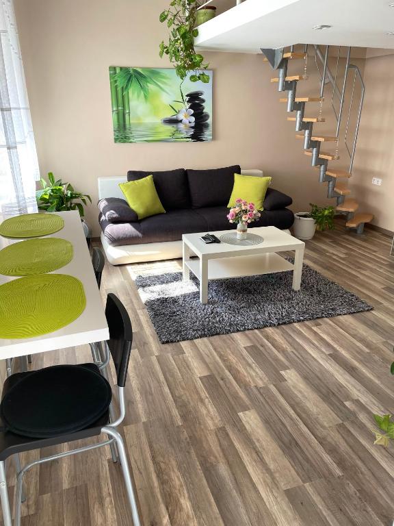 A seating area at Green Island in the downtown with free parking