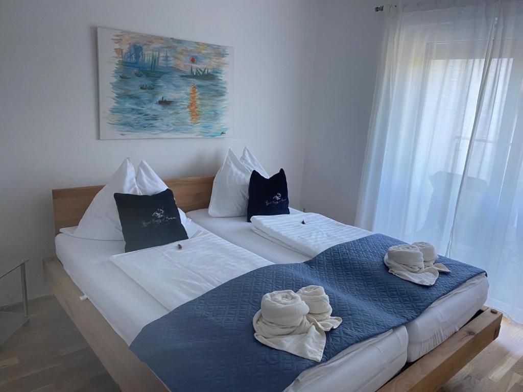 Posteľ alebo postele v izbe v ubytovaní Quality See Apartments Reifnitz