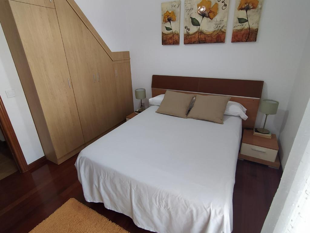 Postel nebo postele na pokoji v ubytování Duplex de 130m2 al lado de las playas de Cuchia