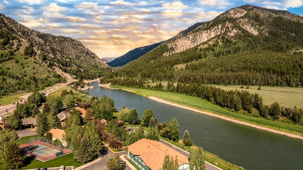 an aerial view of a river and mountains at Flying Saddle Resort and Steak House in Alpine