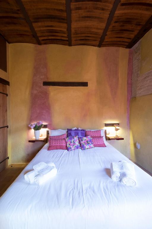 Postel nebo postele na pokoji v ubytování Palazzo d'Assi - Guest house