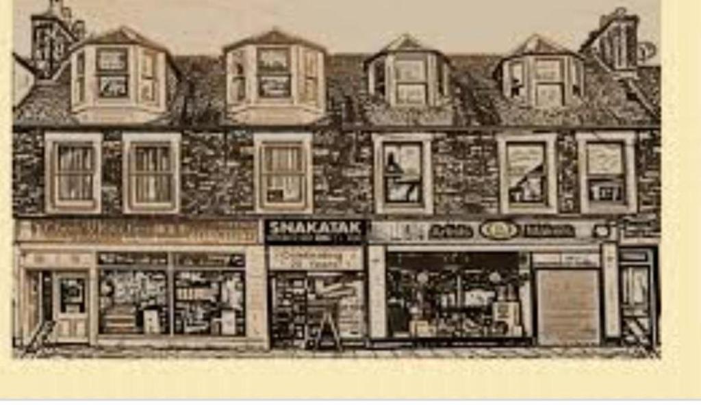 a black and white drawing of a building at Cosy apartment in popular harbour town in Kirkcudbright