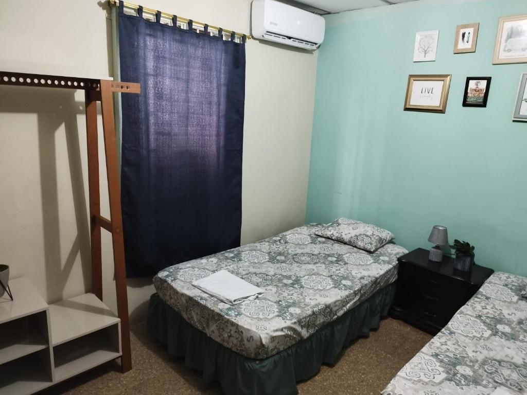 Postel nebo postele na pokoji v ubytování Casa Michael
