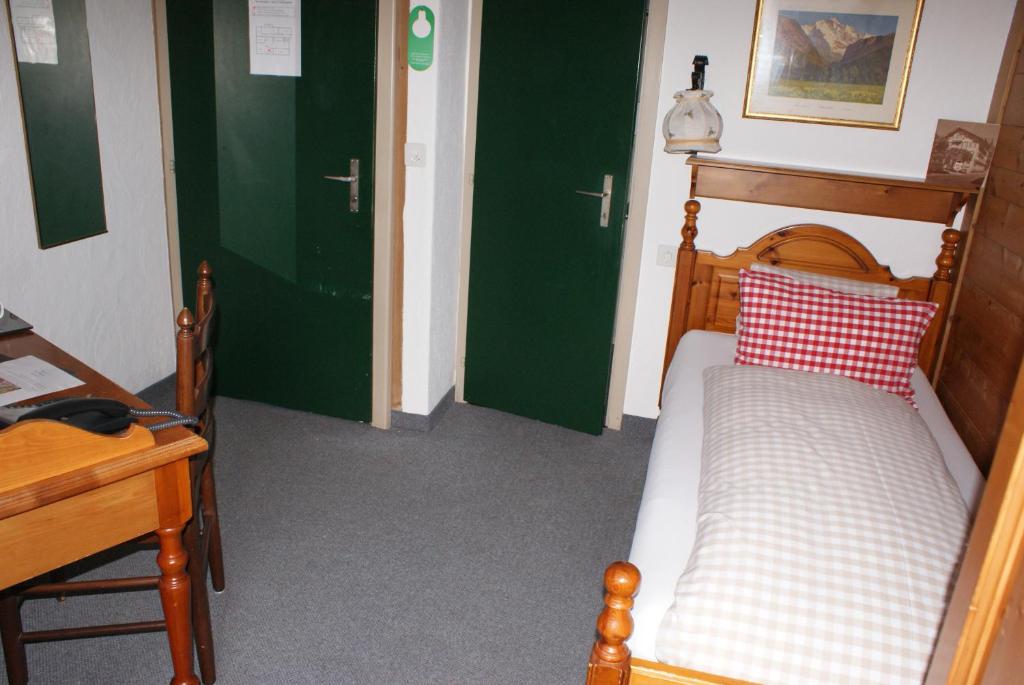 Postel nebo postele na pokoji v ubytování Baeren Hotel, The Bear Inn
