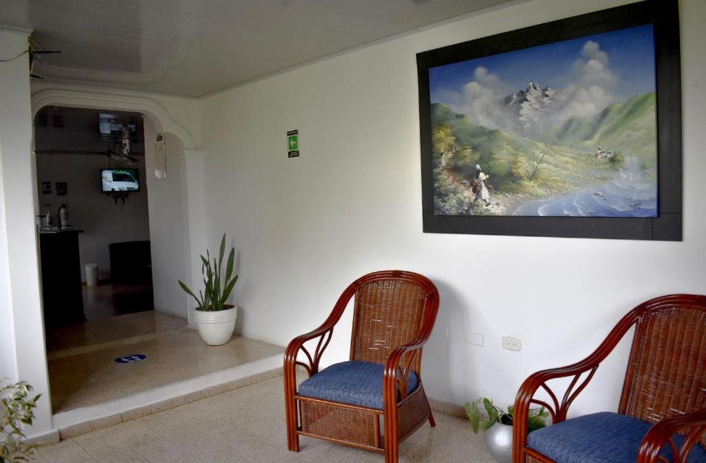 TV a/nebo společenská místnost v ubytování BOUTIQUE HOTEL BALOP Valledupar