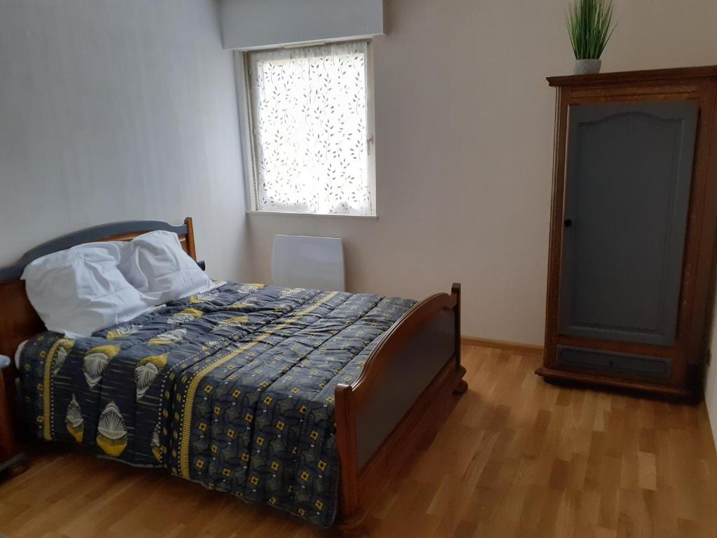Postel nebo postele na pokoji v ubytování Résidence le château Kaysersberg