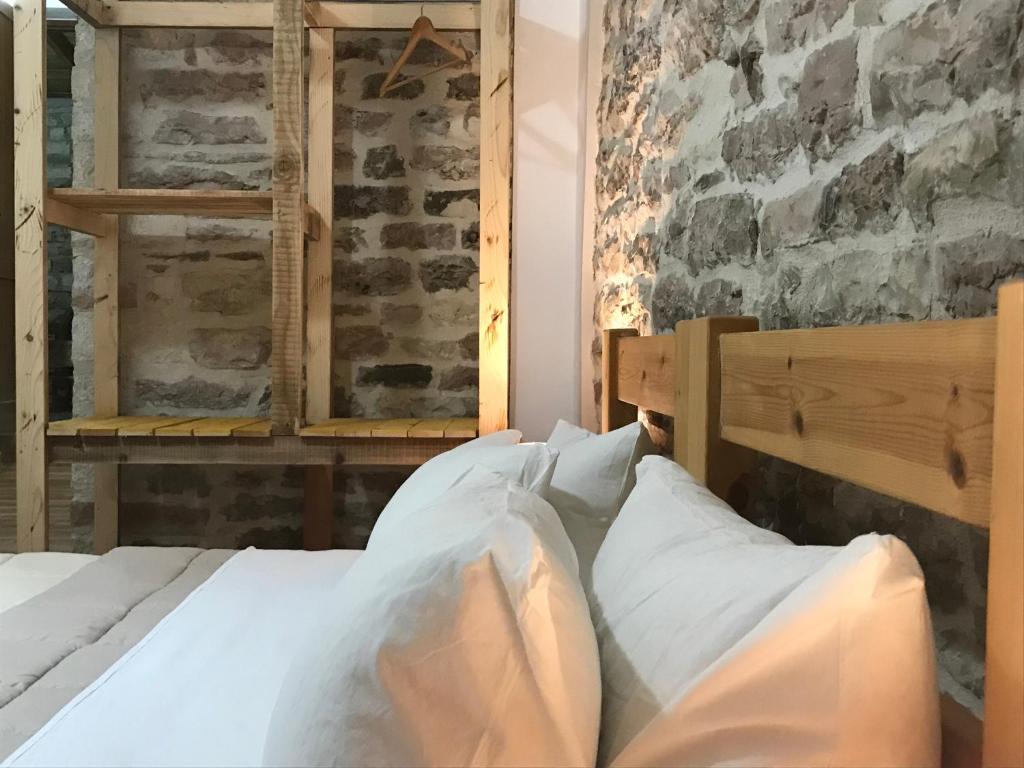 Postel nebo postele na pokoji v ubytování Vila ERI