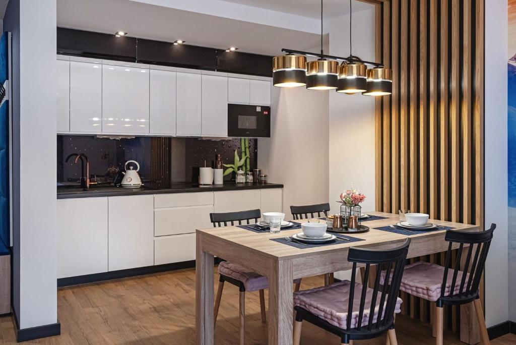 Kuchyň nebo kuchyňský kout v ubytování Apartamenty Osada Antałówka Zakopane