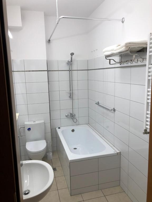 Kúpeľňa v ubytovaní Apartamenty JN Poznań Rzeczna 4