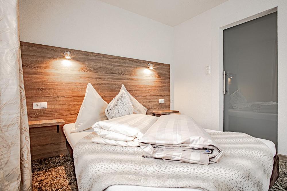Postel nebo postele na pokoji v ubytování Apartments Leszek Elis 141