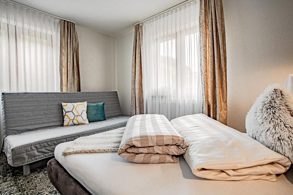 Postel nebo postele na pokoji v ubytování Apartments Leszek Elis 141