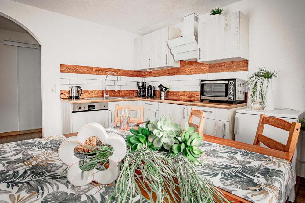 Kuchyň nebo kuchyňský kout v ubytování Apartments Leszek Elis 141