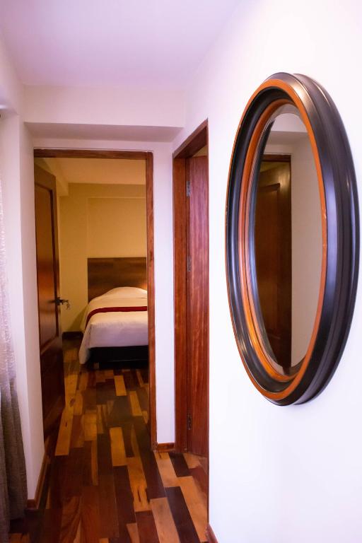Postel nebo postele na pokoji v ubytování Zans Apartments Cusco