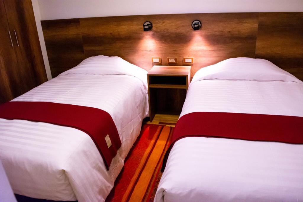 Postel nebo postele na pokoji v ubytování Zans Apartments Cusco