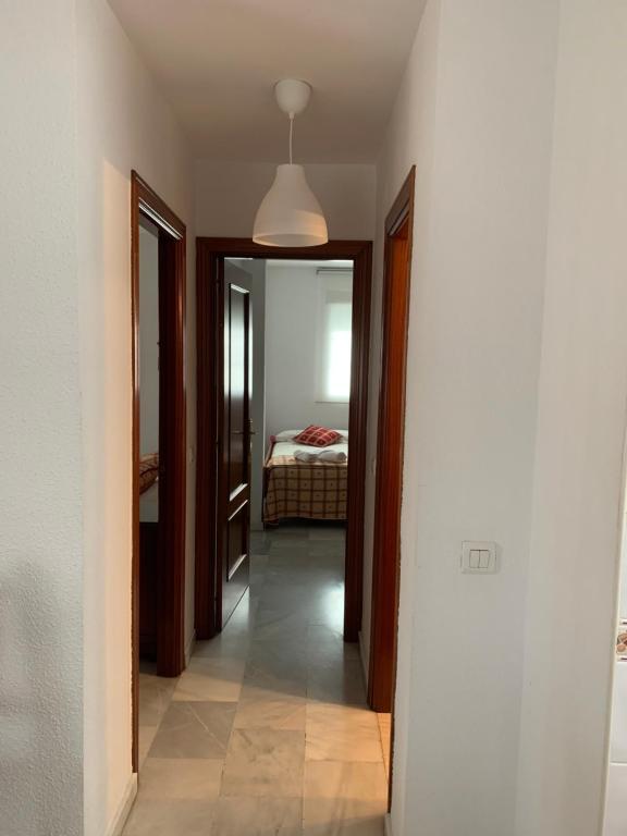 Postel nebo postele na pokoji v ubytování Apartamento Carihuela a 300 metros playa