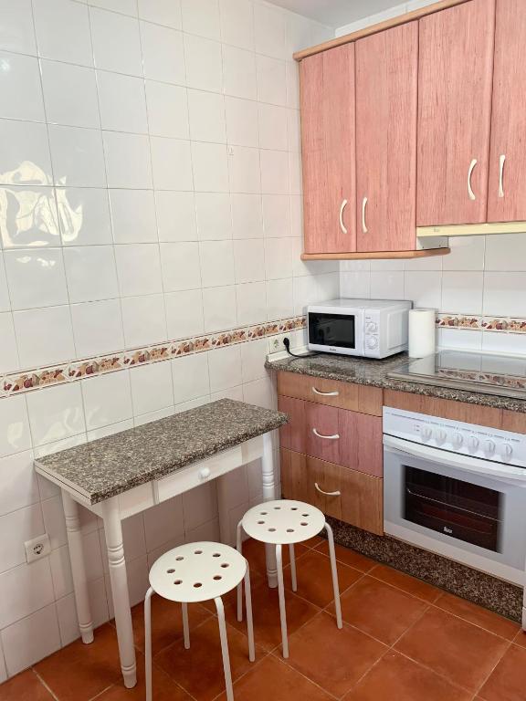 Kuchyň nebo kuchyňský kout v ubytování Apartamento Carihuela a 300 metros playa