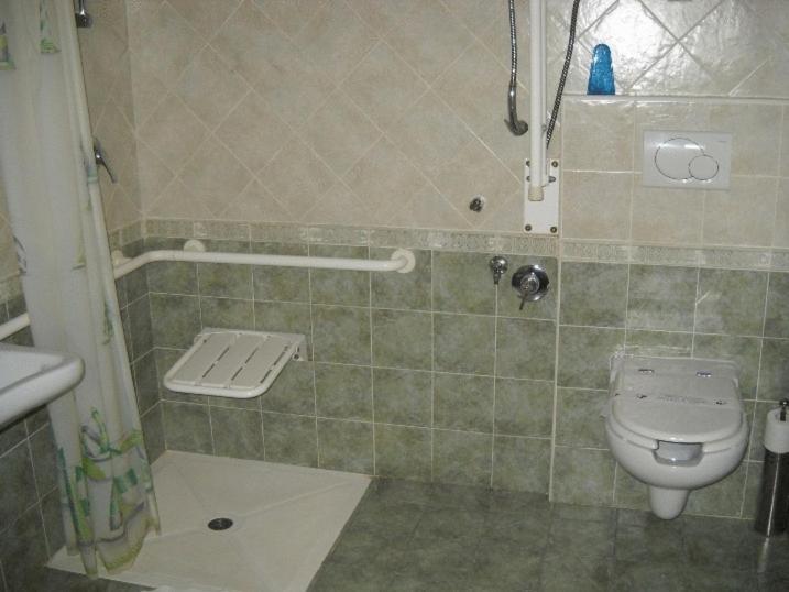 Koupelna v ubytování Hotel Rigolfo