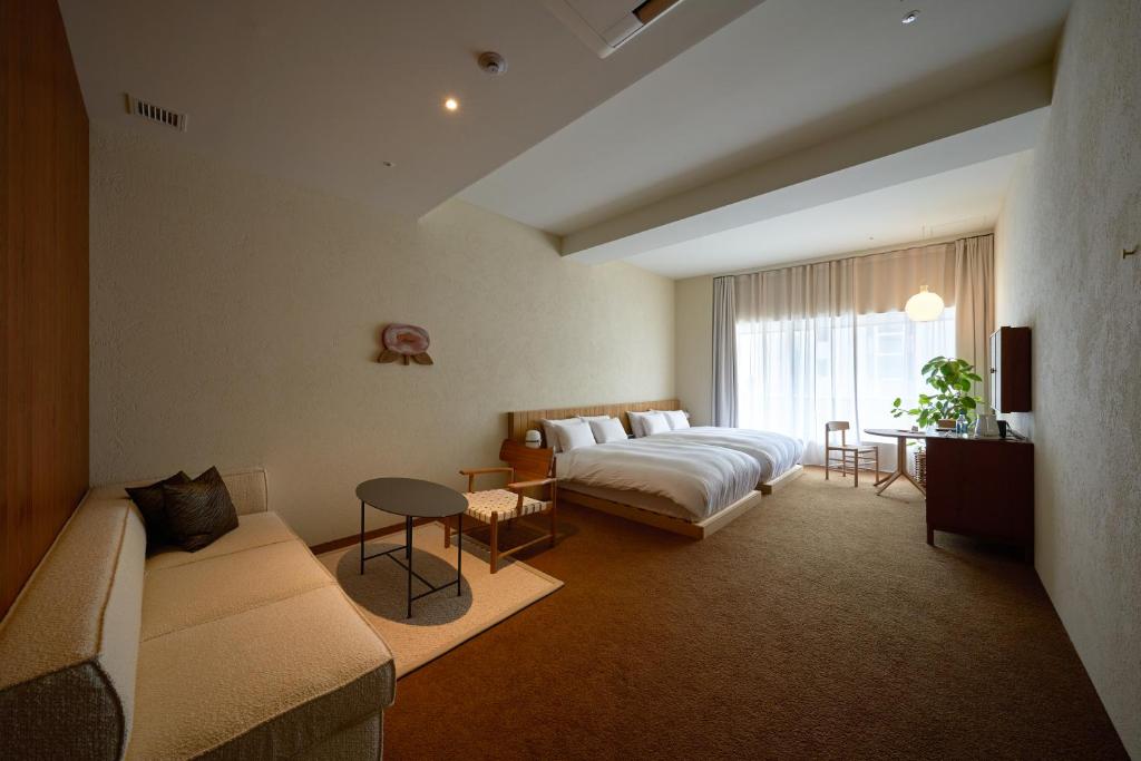 Postel nebo postele na pokoji v ubytování Hotel Lepo Chahal