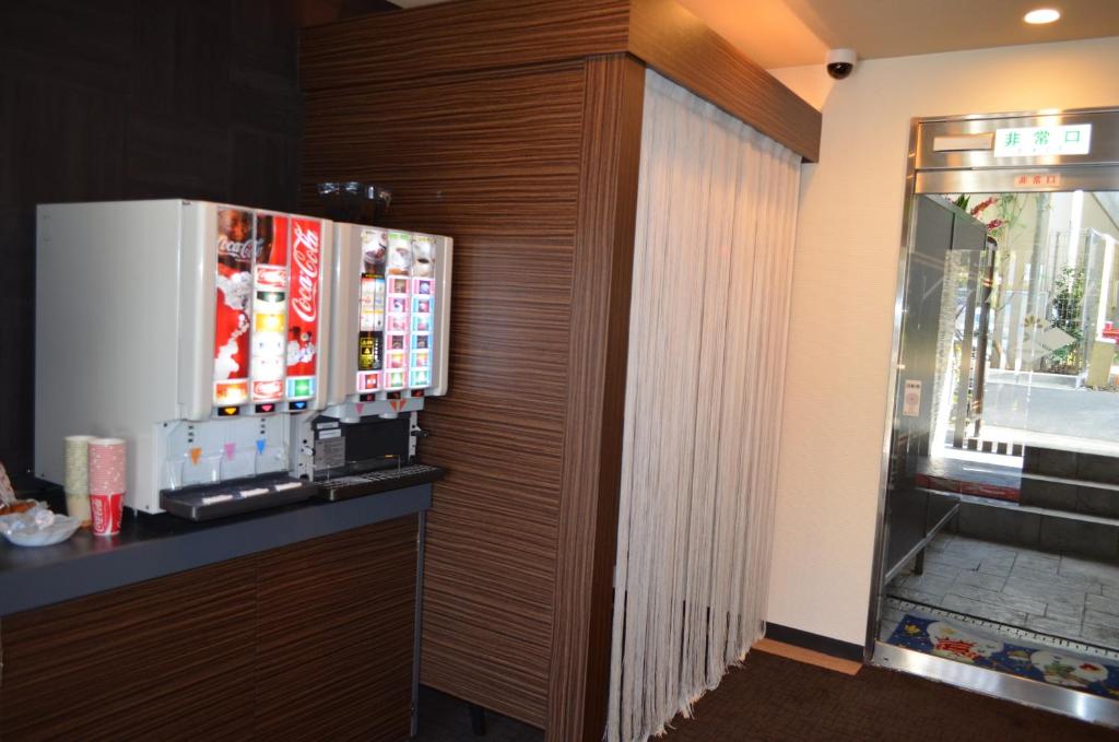 Kuchyň nebo kuchyňský kout v ubytování Amand Hotel