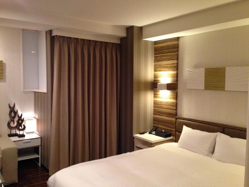 Postel nebo postele na pokoji v ubytování Amand Hotel