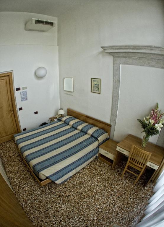 Postel nebo postele na pokoji v ubytování Casa Sant'Andrea