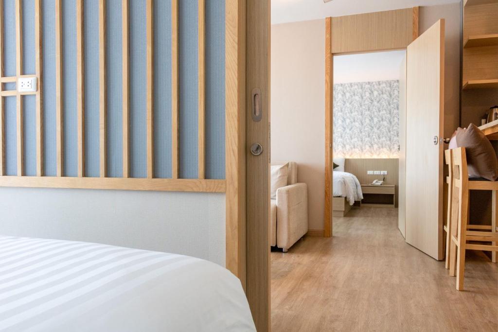 Postel nebo postele na pokoji v ubytování ONE Hotel