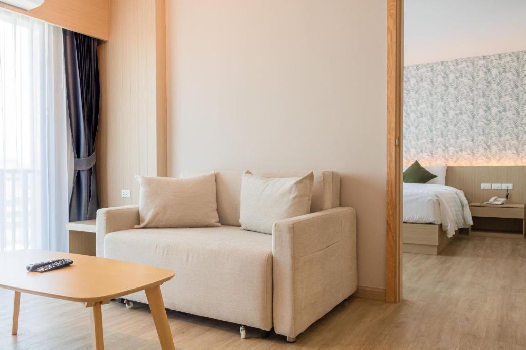 Postel nebo postele na pokoji v ubytování ONE Hotel