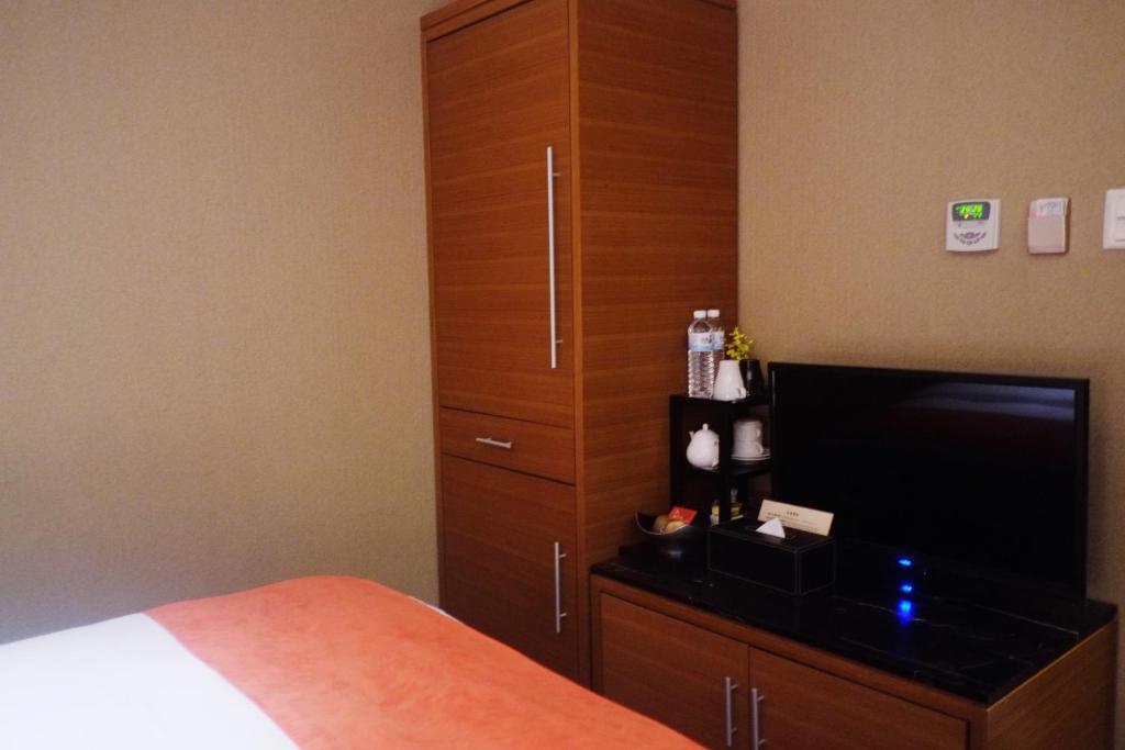 Postel nebo postele na pokoji v ubytování Aqua Bella Hotel