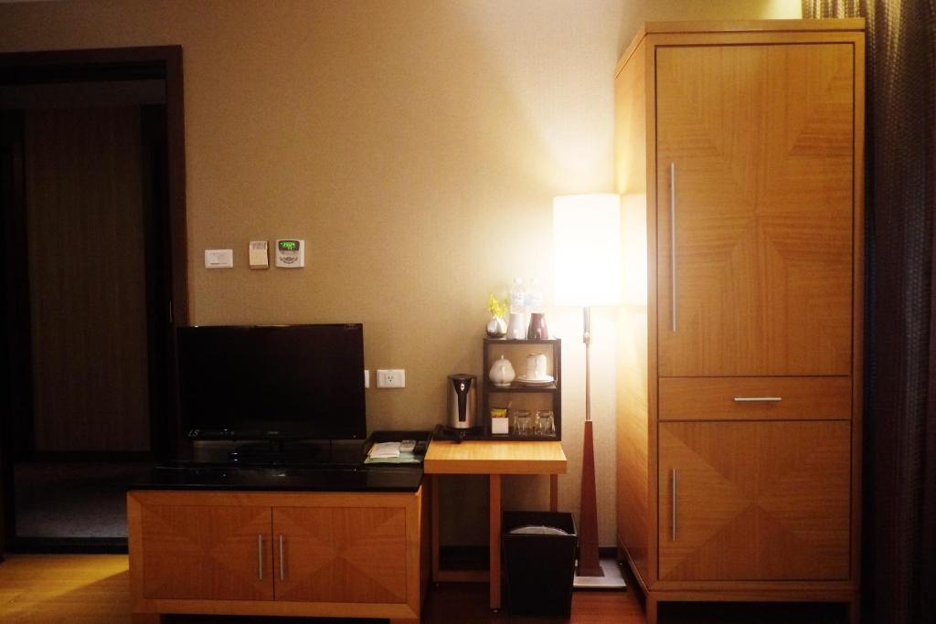 TV a/nebo společenská místnost v ubytování Aqua Bella Hotel