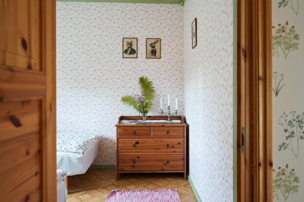Postel nebo postele na pokoji v ubytování Savolax Stugor