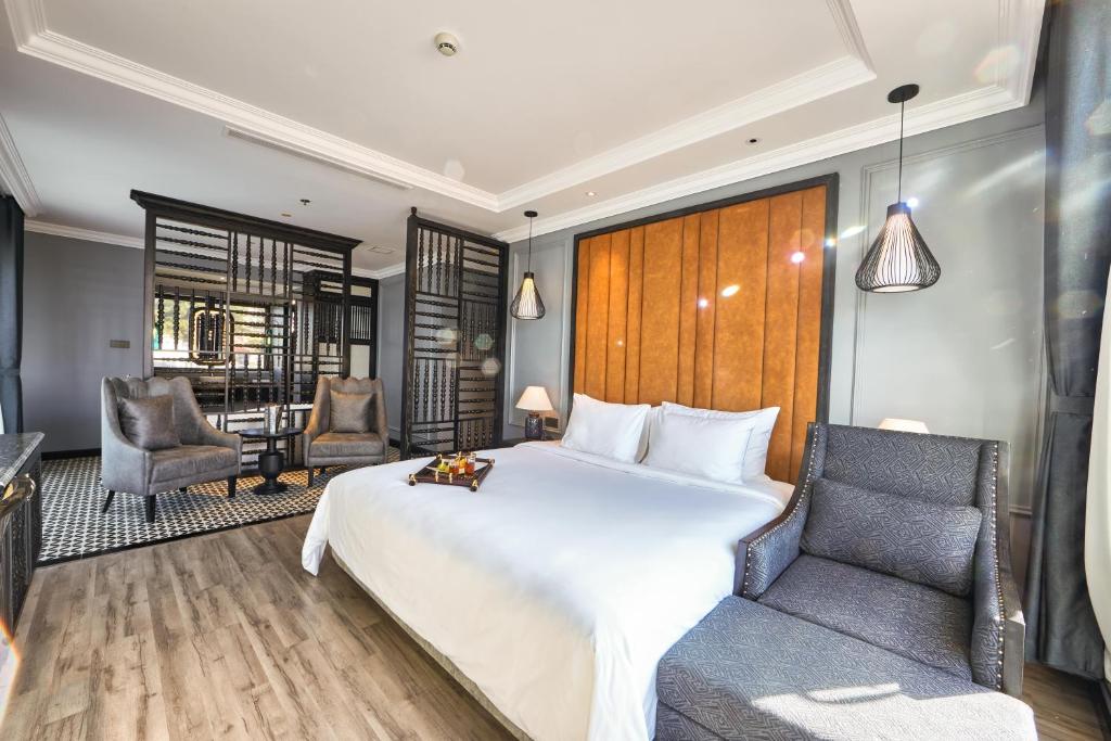 Postel nebo postele na pokoji v ubytování Hotel DMelin