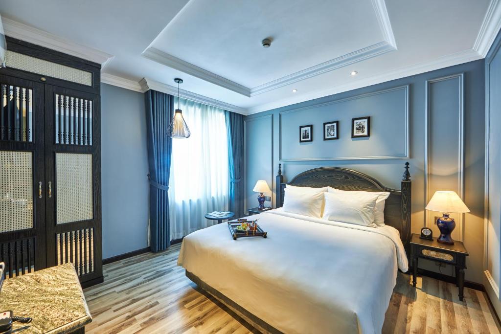Postel nebo postele na pokoji v ubytování Hotel DMelin