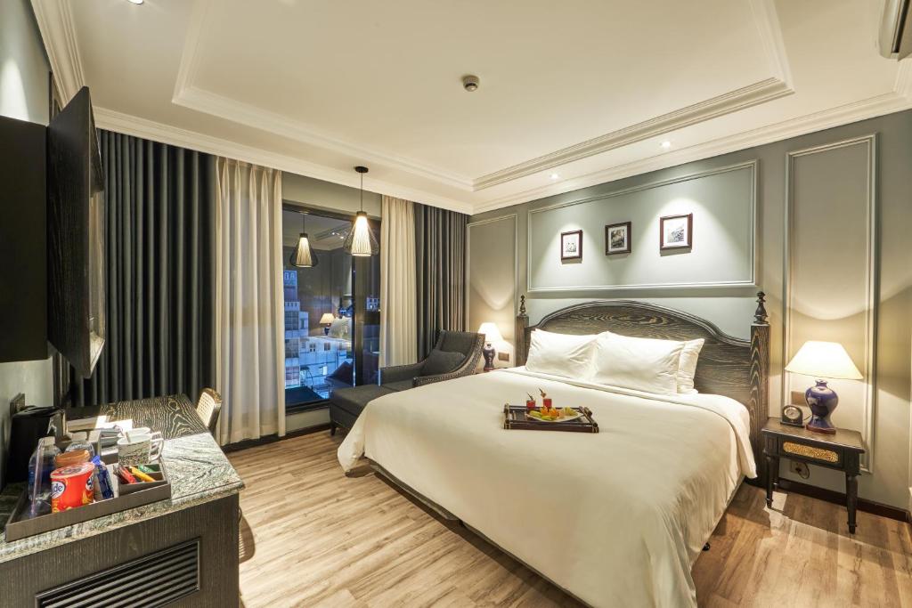 Postel nebo postele na pokoji v ubytování Hotel DMelin