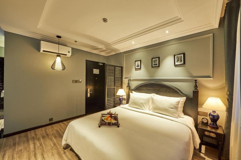 Postel nebo postele na pokoji v ubytování Hotel DMelin