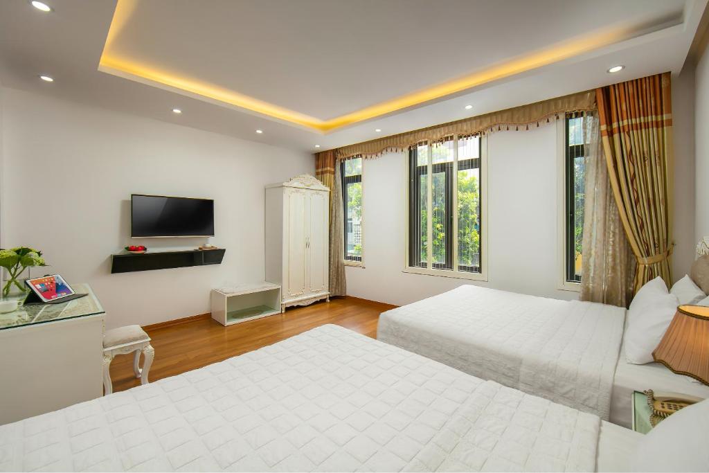 TV a/nebo společenská místnost v ubytování Hanoi Kingly Hotel