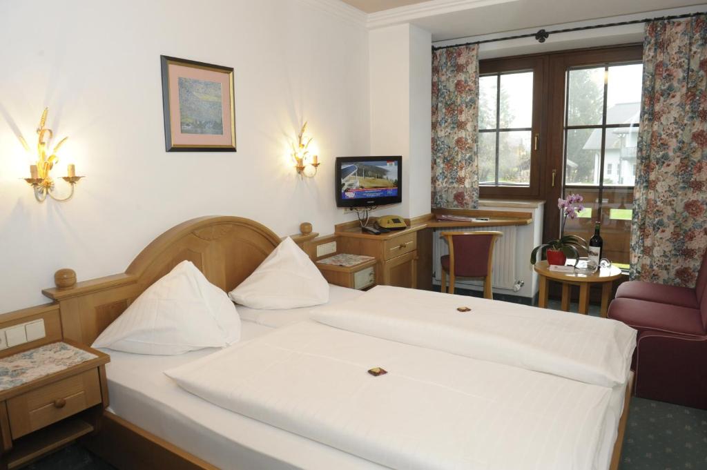Postel nebo postele na pokoji v ubytování Hotel Stegmühlhof