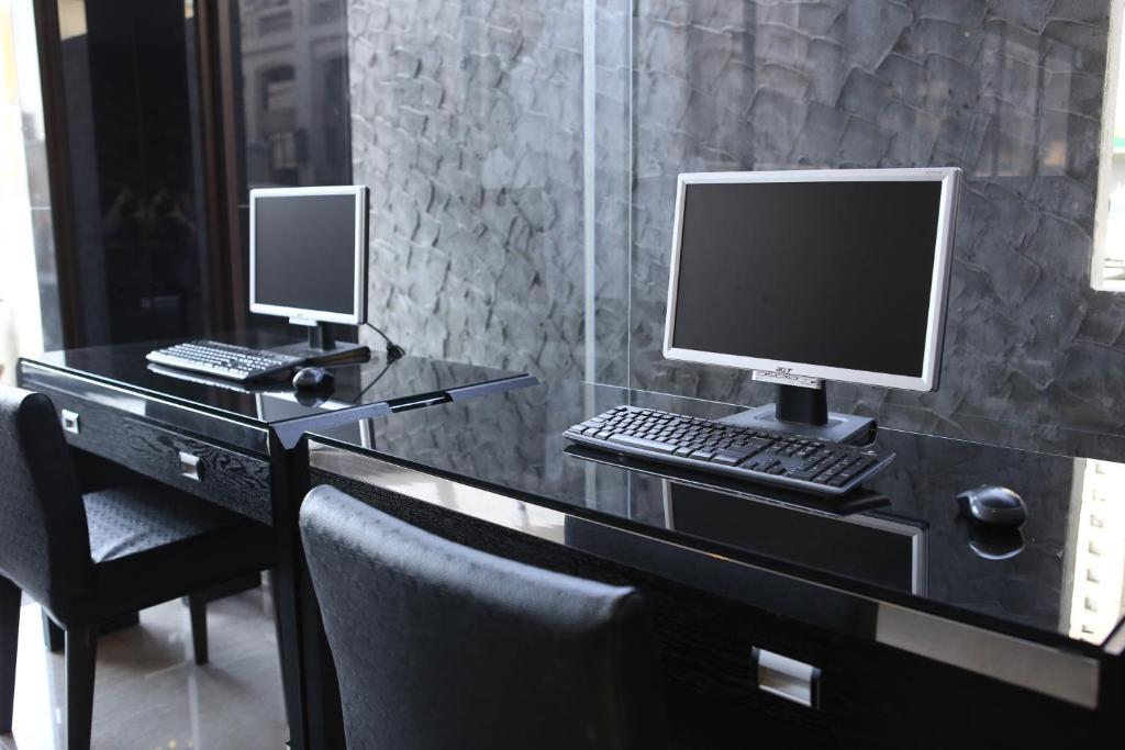 TV a/nebo společenská místnost v ubytování KUN Hotel