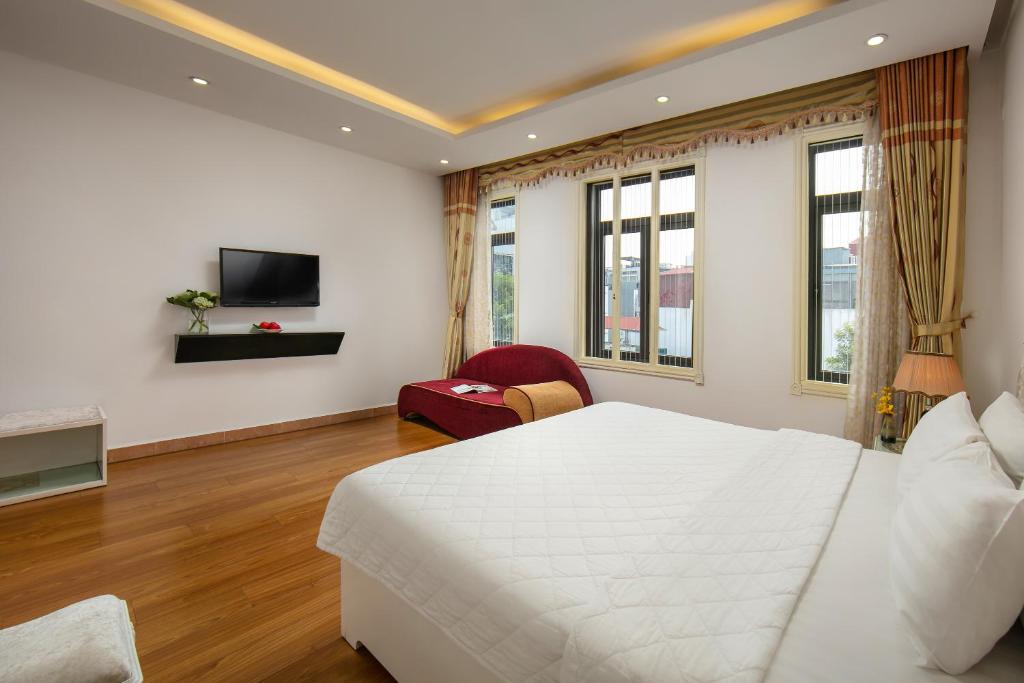 TV a/nebo společenská místnost v ubytování Hanoi Kingly Hotel