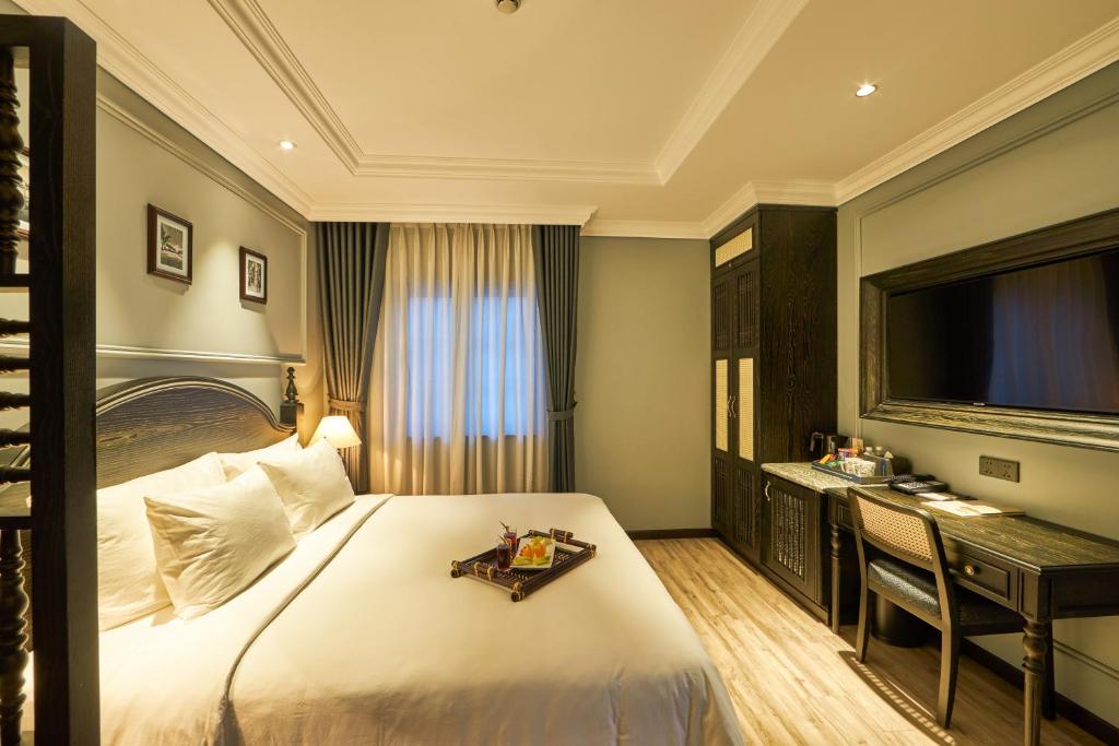 Postel nebo postele na pokoji v ubytování Hotel DMelin