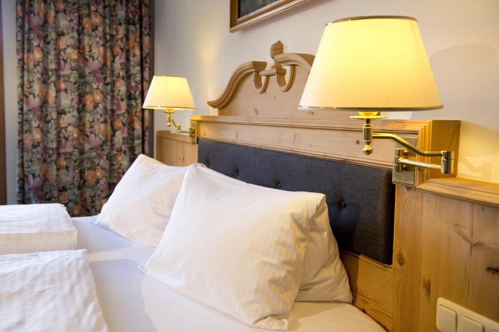 Postel nebo postele na pokoji v ubytování Hotel Wiesenegg