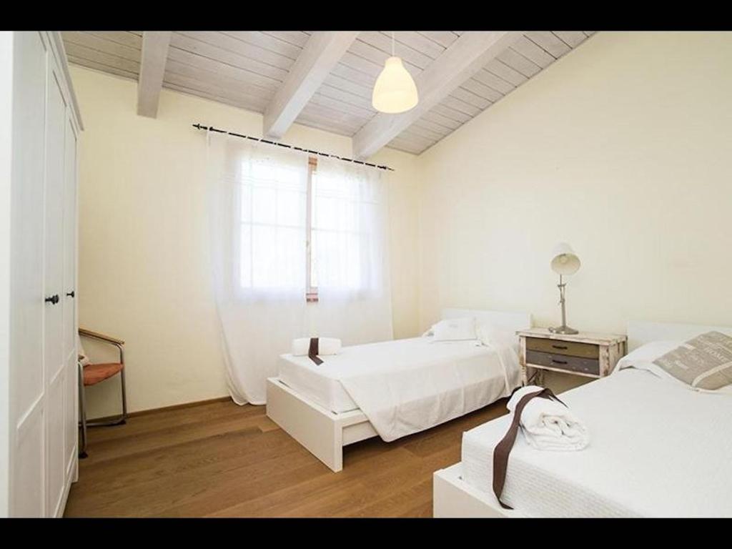Fotografia z galérie ubytovania Appartament Rosmarino - Cignella Resort v destinácii Osteria Delle Noci