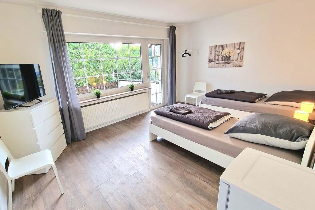 Ένα ή περισσότερα κρεβάτια σε δωμάτιο στο Duplex Apartment with Roof-Top -MND01-