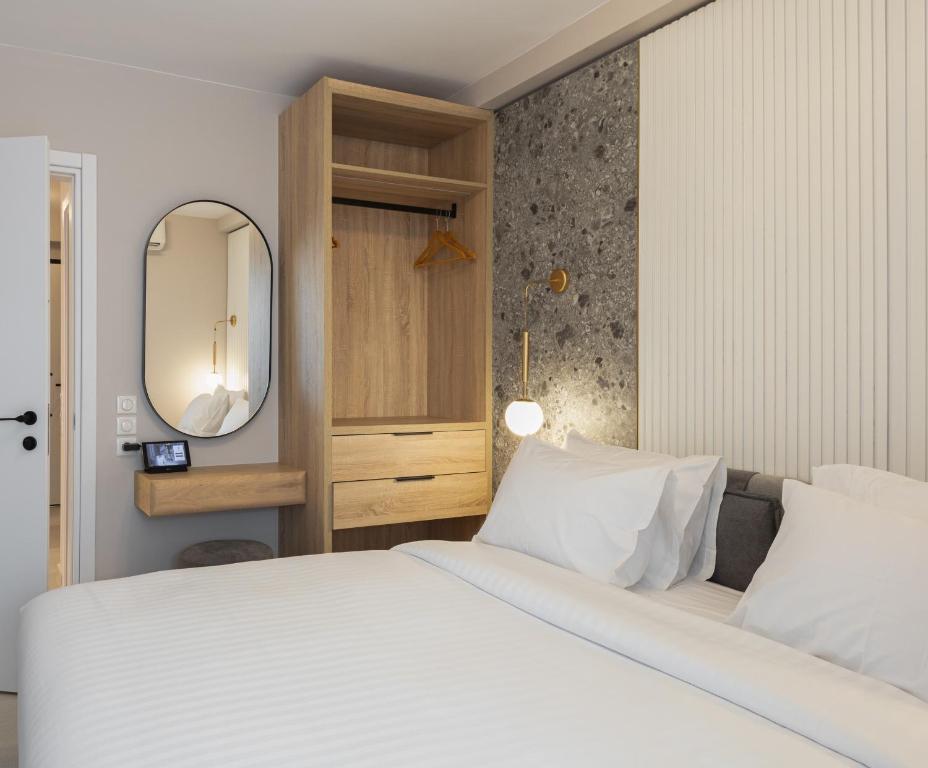 Posteľ alebo postele v izbe v ubytovaní LUX&EASY Athens Downtown Residences