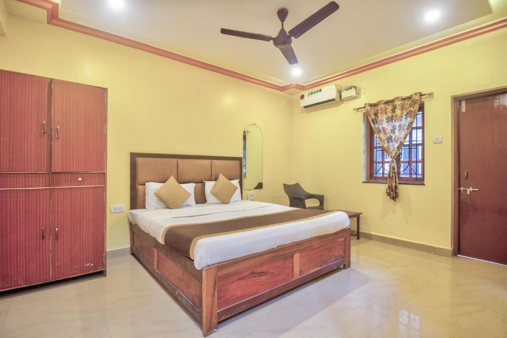Postel nebo postele na pokoji v ubytování Hotel Purushottam Residency
