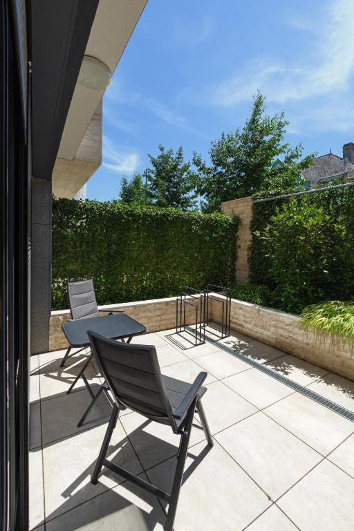 Rõdu või terrass majutusasutuses Spa Residence Carbona Great Time Apartman