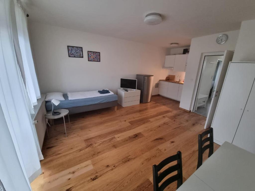 Posteľ alebo postele v izbe v ubytovaní Flataid Apartmenthaus Brauhausstrasse