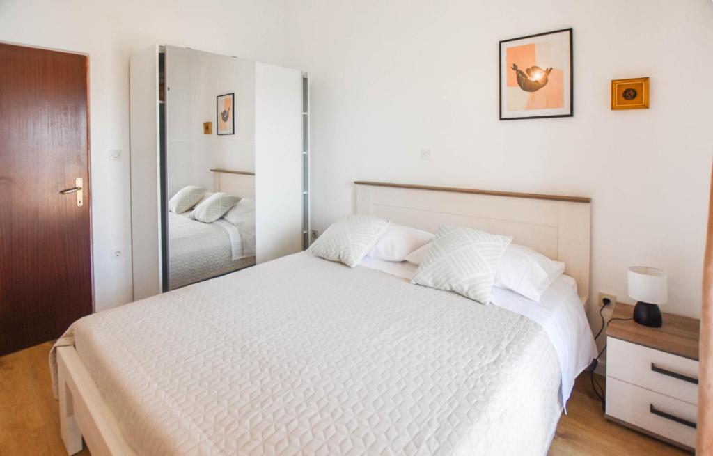 Łóżko lub łóżka w pokoju w obiekcie Apartments Anchor