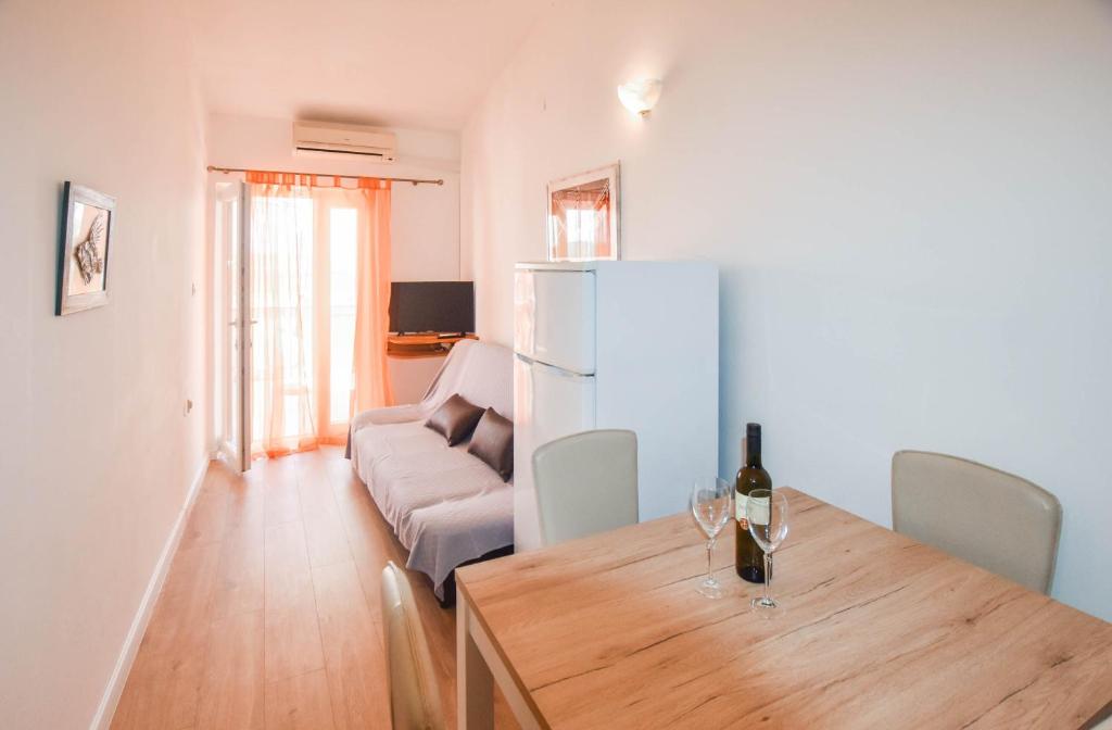 Telewizja i/lub zestaw kina domowego w obiekcie Apartments Anchor