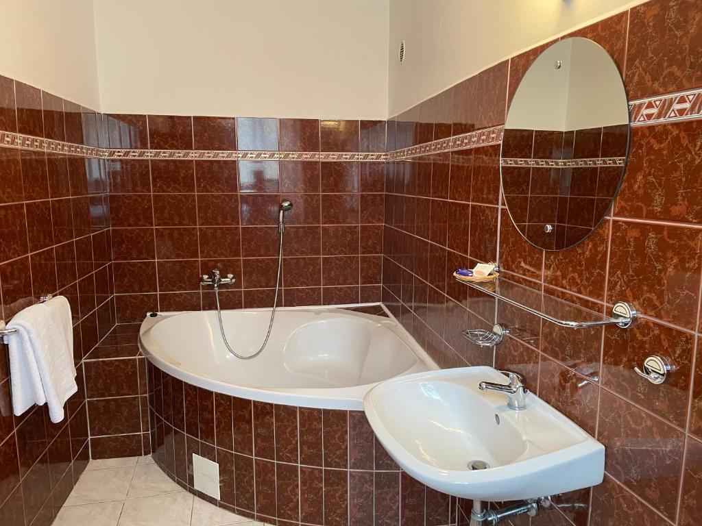 Koupelna v ubytování Hotel Ennius