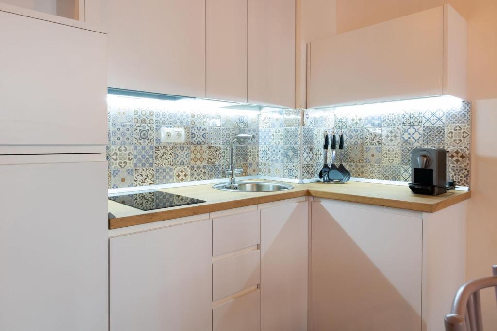 Kuchyň nebo kuchyňský kout v ubytování Fabie Triana Loft by Valcambre